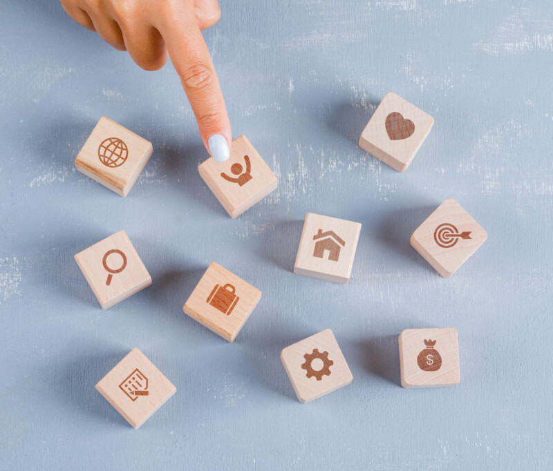 Business concept on plaster background flat lay. finger showing